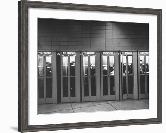 Busy Telephone Booths During an Airline Strike-Robert W^ Kelley-Framed Photographic Print