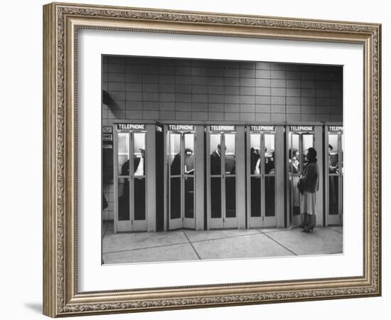 Busy Telephone Booths During an Airline Strike-Robert W^ Kelley-Framed Photographic Print