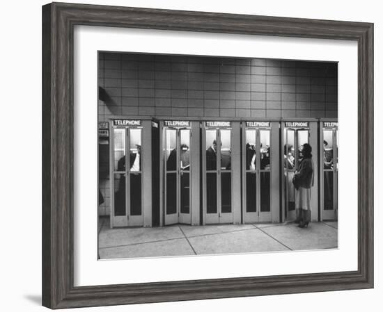 Busy Telephone Booths During an Airline Strike-Robert W^ Kelley-Framed Photographic Print