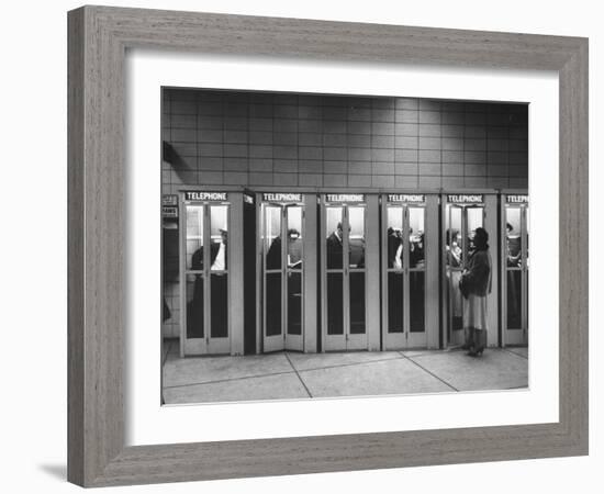 Busy Telephone Booths During an Airline Strike-Robert W^ Kelley-Framed Photographic Print