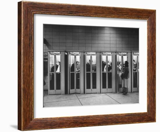 Busy Telephone Booths During an Airline Strike-Robert W^ Kelley-Framed Photographic Print