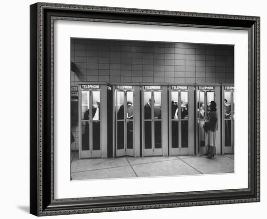 Busy Telephone Booths During an Airline Strike-Robert W^ Kelley-Framed Photographic Print