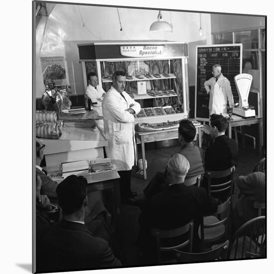 Butcher from Danish Bacon Giving a Demonstration, Kilnhurst, South Yorkshire, 1961-Michael Walters-Mounted Photographic Print