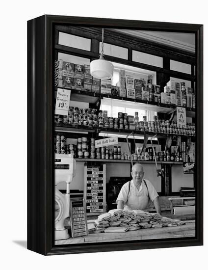 Butcher Standing at Meat Counter of Deli-Alfred Eisenstaedt-Framed Premier Image Canvas