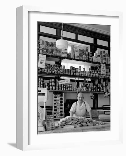 Butcher Standing at Meat Counter of Deli-Alfred Eisenstaedt-Framed Photographic Print