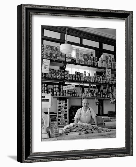 Butcher Standing at Meat Counter of Deli-Alfred Eisenstaedt-Framed Photographic Print
