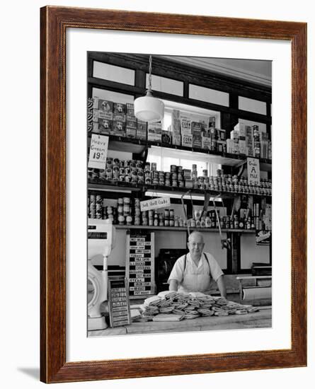 Butcher Standing at Meat Counter of Deli-Alfred Eisenstaedt-Framed Photographic Print