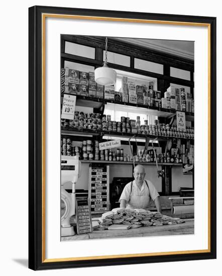 Butcher Standing at Meat Counter of Deli-Alfred Eisenstaedt-Framed Photographic Print