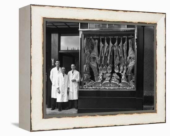 Butchers Standing Next to their Shop Window Display, South Yorkshire, 1955-Michael Walters-Framed Premier Image Canvas