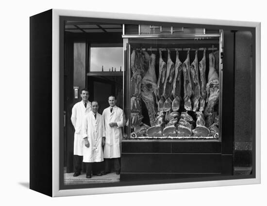 Butchers Standing Next to their Shop Window Display, South Yorkshire, 1955-Michael Walters-Framed Premier Image Canvas