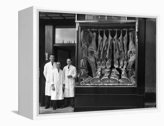 Butchers Standing Next to their Shop Window Display, South Yorkshire, 1955-Michael Walters-Framed Premier Image Canvas