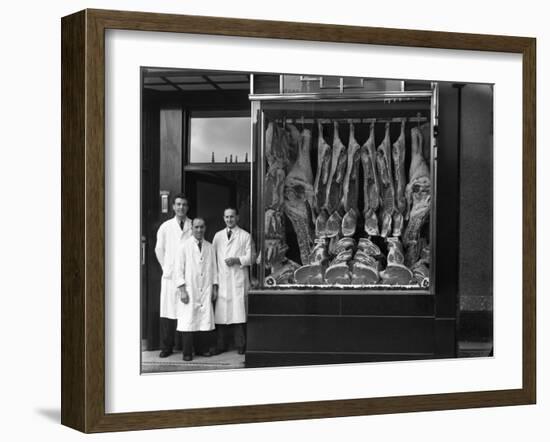 Butchers Standing Next to their Shop Window Display, South Yorkshire, 1955-Michael Walters-Framed Photographic Print