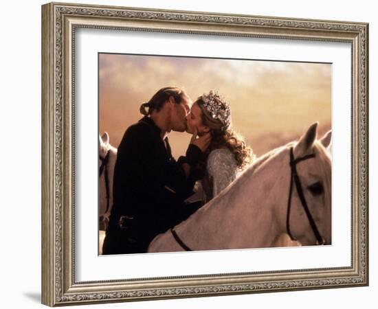 Buttercup and Westley Kissing on Horseback-null-Framed Photo