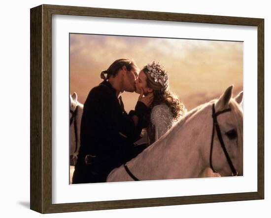 Buttercup and Westley Kissing on Horseback-null-Framed Photo