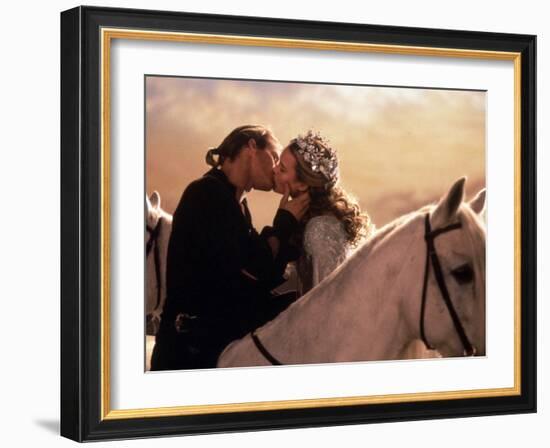 Buttercup and Westley Kissing on Horseback-null-Framed Photo