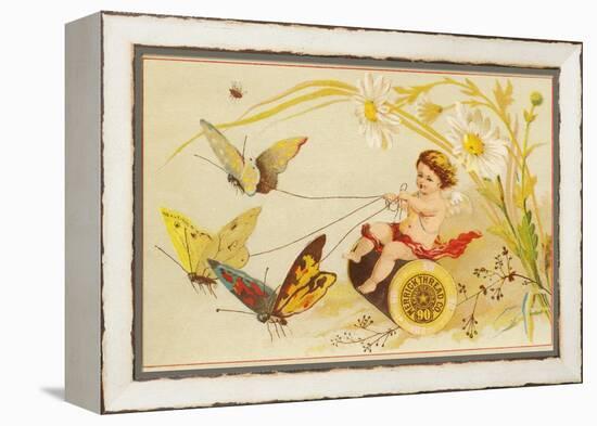 Butterflies Pulling Cherub on Thread Spool Chariot-null-Framed Premier Image Canvas