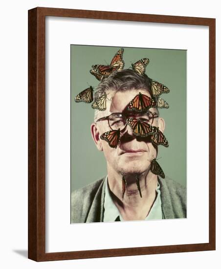 Butterfly Breeder Carl Anderson with Monarch Butterflies on His Face-John Dominis-Framed Photographic Print