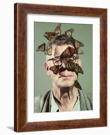 Butterfly Breeder Carl Anderson with Monarch Butterflies on His Face-John Dominis-Framed Photographic Print