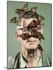 Butterfly Breeder Carl Anderson with Monarch Butterflies on His Face-John Dominis-Mounted Photographic Print