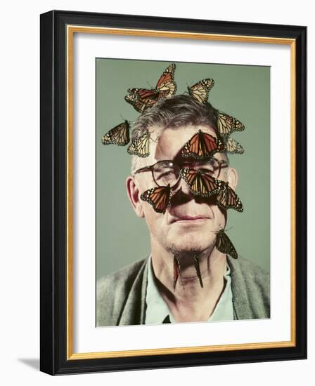 Butterfly Breeder Carl Anderson with Monarch Butterflies on His Face-John Dominis-Framed Photographic Print