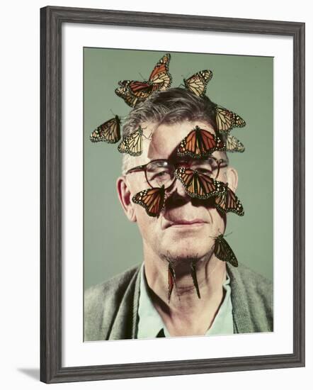 Butterfly Breeder Carl Anderson with Monarch Butterflies on His Face-John Dominis-Framed Photographic Print