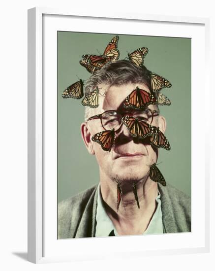 Butterfly Breeder Carl Anderson with Monarch Butterflies on His Face-John Dominis-Framed Photographic Print