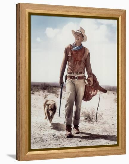 ca., 1953 --- Actor John Wayne on the movie set of "Hondo" (Hondo, L'Homme du Desert), directed by-null-Framed Stretched Canvas