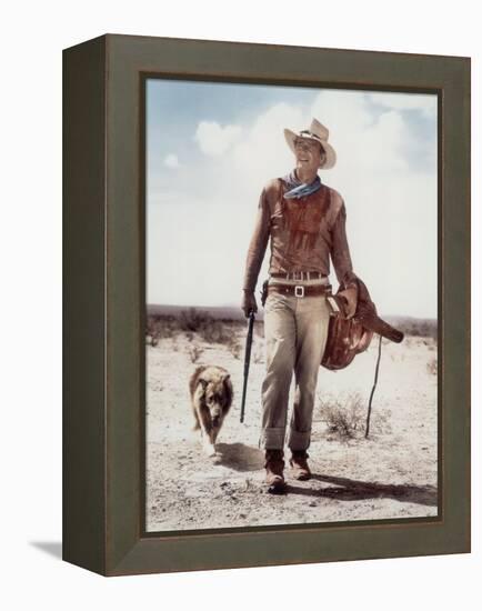 ca., 1953 --- Actor John Wayne on the movie set of "Hondo" (Hondo, L'Homme du Desert), directed by-null-Framed Stretched Canvas