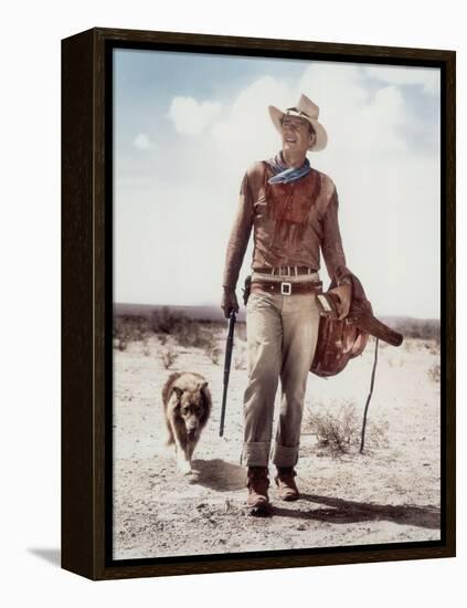 ca., 1953 --- Actor John Wayne on the movie set of "Hondo" (Hondo, L'Homme du Desert), directed by-null-Framed Stretched Canvas