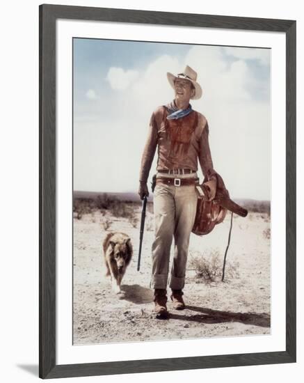 ca., 1953 --- Actor John Wayne on the movie set of "Hondo" (Hondo, L'Homme du Desert), directed by-null-Framed Photo