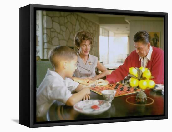 CA Gov. Candidate Ronald Reagan, Wife Nancy and Son Sitting at Table Playing Checkers at Home-Bill Ray-Framed Premier Image Canvas