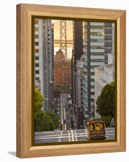 Cable Car Crossing California Street With Bay Bridge Backdrop in San Francisco, California, USA-Chuck Haney-Framed Premier Image Canvas