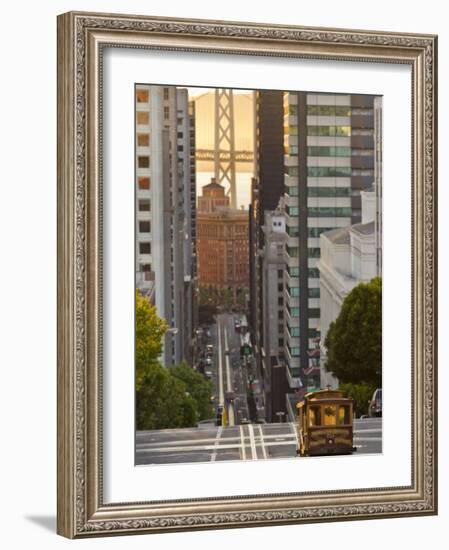 Cable Car Crossing California Street With Bay Bridge Backdrop in San Francisco, California, USA-Chuck Haney-Framed Photographic Print