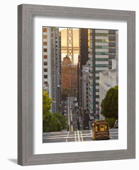 Cable Car Crossing California Street With Bay Bridge Backdrop in San Francisco, California, USA-Chuck Haney-Framed Photographic Print