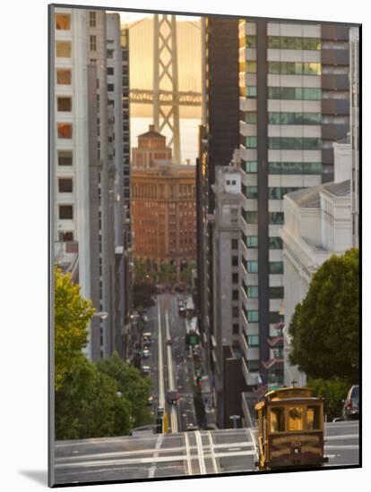 Cable Car Crossing California Street With Bay Bridge Backdrop in San Francisco, California, USA-Chuck Haney-Mounted Photographic Print