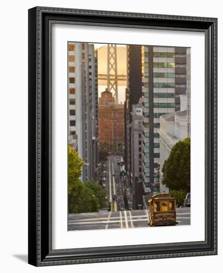 Cable Car Crossing California Street With Bay Bridge Backdrop in San Francisco, California, USA-Chuck Haney-Framed Photographic Print