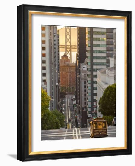 Cable Car Crossing California Street With Bay Bridge Backdrop in San Francisco, California, USA-Chuck Haney-Framed Photographic Print