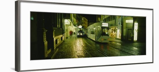 Cable Cars Moving on a Street, Freiburg, Germany-null-Framed Photographic Print