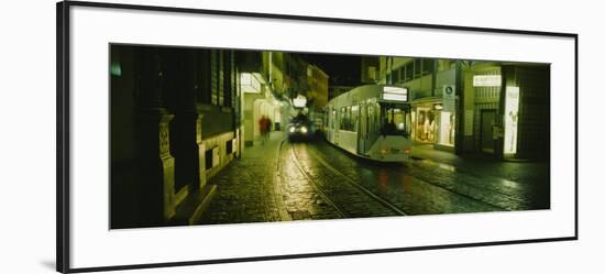 Cable Cars Moving on a Street, Freiburg, Germany-null-Framed Photographic Print
