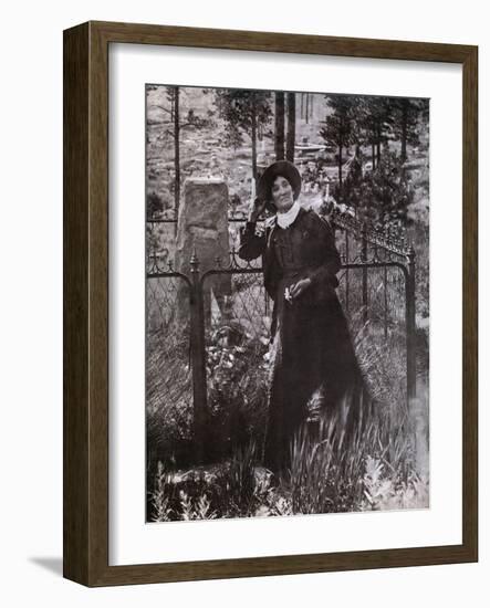 Calamity Jane at the Grave of Buffalo Bill in 1900-null-Framed Photo