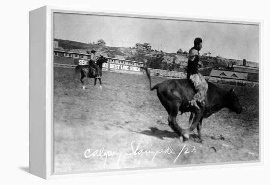 Calgary, Canada - Bullriding at the Stampede-Lantern Press-Framed Stretched Canvas