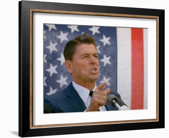 California Gubernatorial Candidate Ronald Reagan Speaking in Front of American Flag Backdrop-Bill Ray-Framed Photographic Print