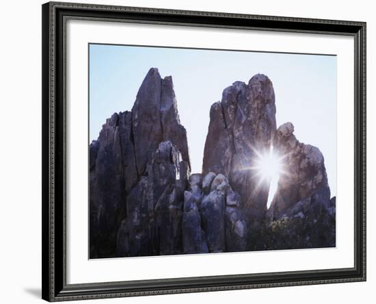 California, Joshua Tree National Park, the Suns Rays Shine Through a Rock Window-Christopher Talbot Frank-Framed Photographic Print