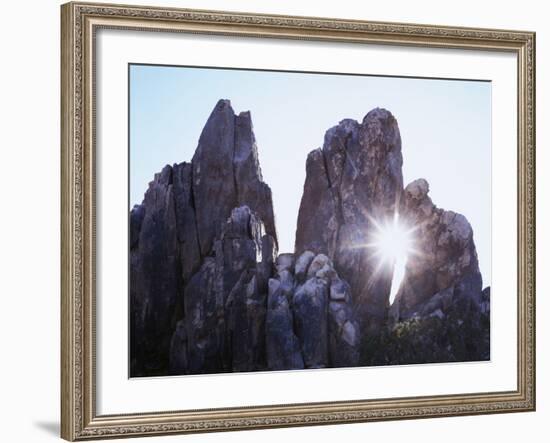 California, Joshua Tree National Park, the Suns Rays Shine Through a Rock Window-Christopher Talbot Frank-Framed Photographic Print