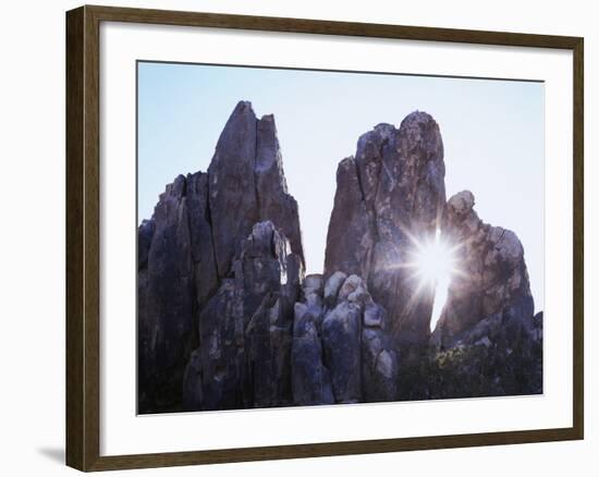 California, Joshua Tree National Park, the Suns Rays Shine Through a Rock Window-Christopher Talbot Frank-Framed Photographic Print