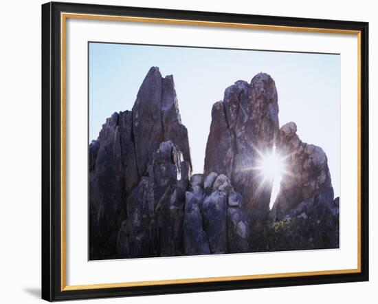 California, Joshua Tree National Park, the Suns Rays Shine Through a Rock Window-Christopher Talbot Frank-Framed Photographic Print