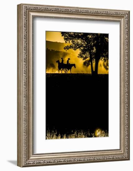 California, Parkfield, V6 Ranch silhouette of two riders faced opposite directions on horseback.-Ellen Clark-Framed Photographic Print