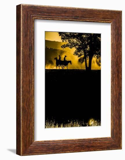 California, Parkfield, V6 Ranch silhouette of two riders faced opposite directions on horseback.-Ellen Clark-Framed Photographic Print