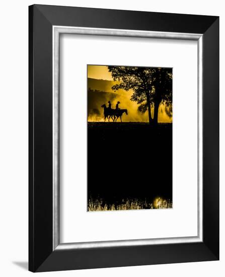 California, Parkfield, V6 Ranch silhouette of two riders faced opposite directions on horseback.-Ellen Clark-Framed Photographic Print