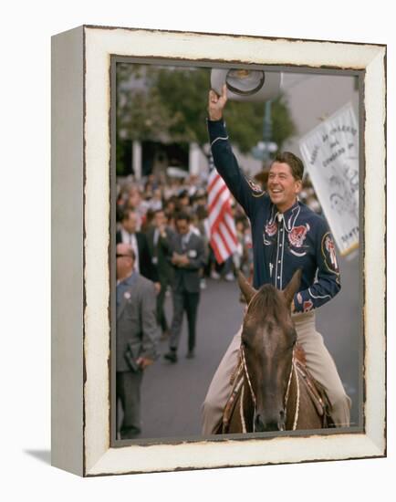 California Republican Gubernatorial Candidate Ronald Reagan in Cowboy Attire, Riding Horse Outside-Bill Ray-Framed Premier Image Canvas